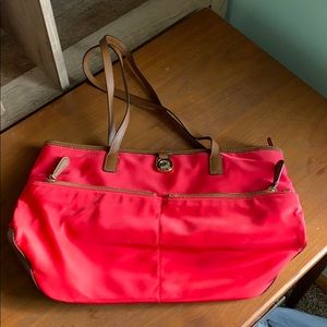 Michael Kors red handbag.